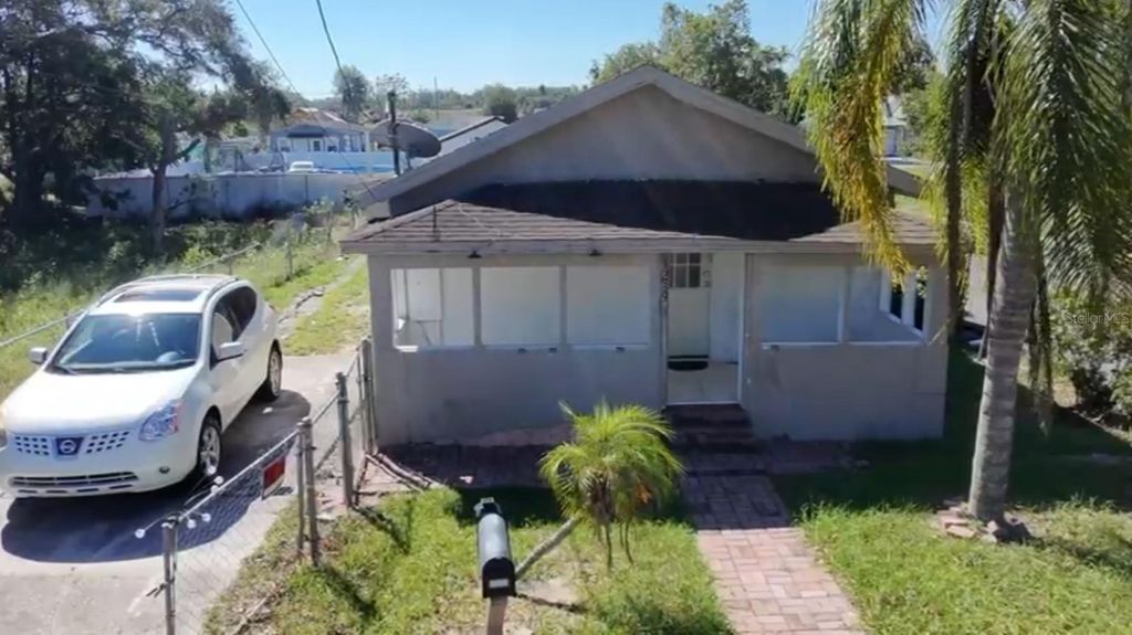 Photo of 1239 Avenue K, Haines City, FL 33844 (MLS # S5136037)
