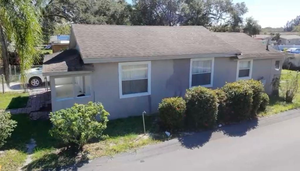Photo of 1239 Avenue K, Haines City, FL 33844 (MLS # S5136037)