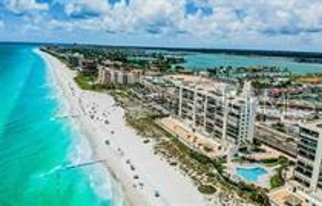 Photo of 14125 Palm Street, Madeira Beach, FL 33708 (MLS # TB8499290)