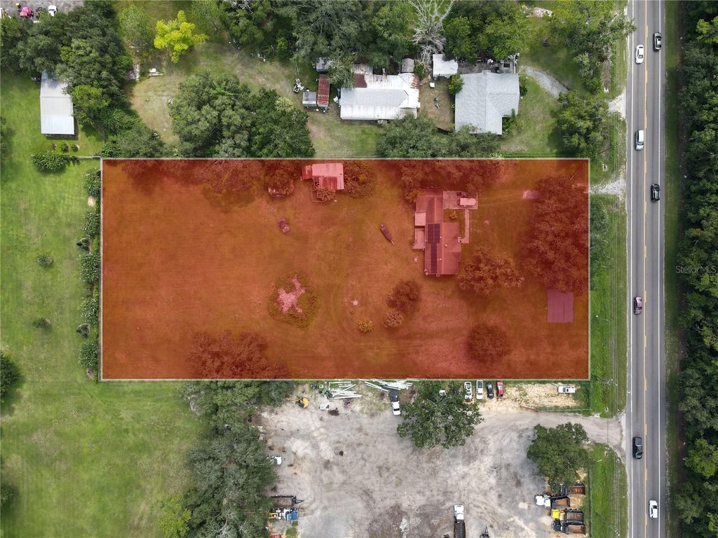 Photo of 6043 S Orange Blossom Trail, Davenport, FL 33896 (MLS # O6392531)