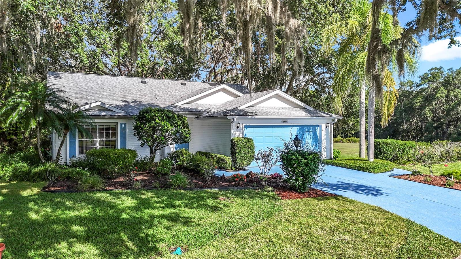 One-of-a-Kind Eleuthera Model in a Premium Location! Welcome to this beautifully maintained Eleuthera model, nestled in one of the most desirable areas of Plantation. Located on the picturesque Glen Eagle Drive, this home is set on a quiet street lined with a stunning canopy of mature trees, offering a peaceful and scenic drive as you arrive. Enjoy the ultimate in privacy and tranquility with a fantastic backyard surrounded by nature. Directly across the street, take in lovely views of the Plantation Golf Course, making this location truly exceptional.Inside, the home boasts a spacious and open-concept layout, highly sought after for its bright and airy feel. The kitchen seamlessly connects to the dining room, featuring a large pantry and easy access to the covered lanai—perfect for indoor-outdoor entertaining. This home offers: 3 spacious bedrooms, 2 full bathrooms, 2-car garage, Indoor laundry room, Huge screened lanai with brand-new indoor/outdoor carpet. Additional open-air patio with a hot tub (included with the sale). Recent upgrades include: New roof (2015), New HVAC system (2017), New Carpet, Solar panels for water heating. This home combines comfort, efficiency, and nature-filled serenity in a highly desirable neighborhood. Don’t miss your chance to own a piece of paradise on Glen Eagle Drive! Enjoy leisurely rounds of golf on two 18-hole courses, stay active with lighted tennis courts, or relax by one of the three sparkling pools and Jacuzzis.For those who love staying fit, the world-class fitness centers and Volleyball & Pickleball courts will keep you engaged. With over 100 planned activities each week, you’ll always have something fun to look forward to. The scenic, landscaped boulevards and serene lakes a peaceful backdrop, perfect for fishing or simply unwinding. Plus, with three expansive clubhouses and a delicious on-site restaurant, everything you need is right at your doorstep.The Plantation at Leesburg is a active 55+ community.