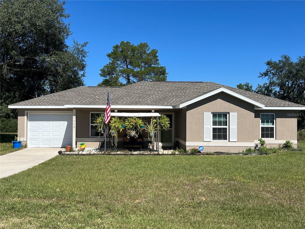 Photo of 115 Malauka Radial, Ocklawaha, FL 32179 (MLS # OM734477)