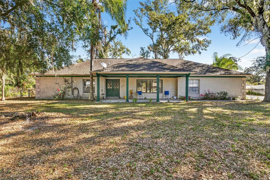 Welcome to North Brandon! Walk into the foyer and to the right is a large living room with a beautiful bow picture window giving a panoramic view of the mature oaks and landscaped front yard. Around the corner is the quaint dining room where the dinner table is the heart of the home. There is fresh paint through out the home. The large master bedroom has 2 convenient closets, one being a walk-in. The cozy family room has a wood burning fireplace and exposed wood ceiling beams, adding warmth and character, and giving texture to the room. In addition there is a breakfast nook with another large bow picture window. The kitchen is a good size and leads to the laundry room. The 2 car garage is spacious and has a work area with peg boards to keep all your tools organized. The lanai is screened and spacious, with plenty of room to relax or entertain. In the back is a nice 16ft x 10ft shed for extra storage. There is also a stand-up attic for storage.  The back yard is fenced to keep your pets from roaming. The driveway has an extra area to park more vehicles, if need be. The roof is scheduled to be replaced in 30 days and it will come with a warranty. There are 3 schools nearby, and this location is near all major highways, shopping, and restaurants. This home has had 3 family generations living here and has been well maintained. Come take a look, this may be the home for you!