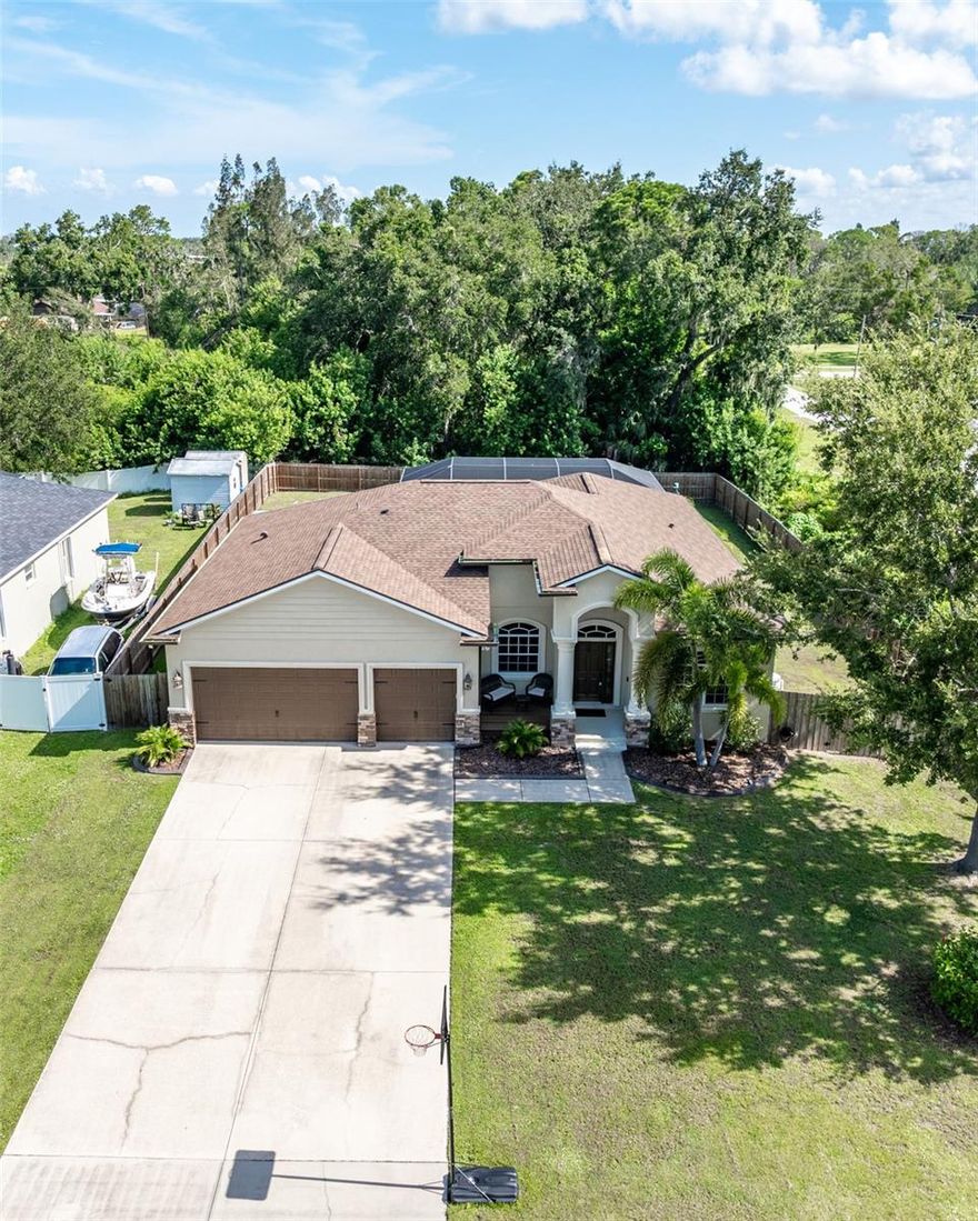 This is the one!!!....SELLER IS MOTIVATED!!  NO HOA & NO CDD! Bring all your toys to this hidden gem in Ruskin! This spacious 4-bedroom, 3-bath home is tucked away at the end of the road on a private, fully fenced lot – perfect for those who value space and privacy. The yard offers plenty of room for your boat, RV, or anything else you need to store! Inside, you'll find numerous upgrades including beautiful new flooring, granite countertops, and fresh interior paint. This split floor plan provides privacy for everyone and even includes a dedicated office! The kitchen – the true heart of the home – is dressed to impress with its elegant design, overlooking the family room with stunning views of the yard and pool area. The master bedroom is a private  retreat with a luxurious master bathroom, while the secondary bedrooms are generously sized and sure to please. Two of the bedrooms share a jack and jill bathroom!! Step outside to your own backyard oasis with a private pool and plenty of shaded space, perfect for entertaining or simply relaxing. This home is truly move-in ready and waiting for its next owner!  Don’t miss out on this rare find – schedule your showing today! BRAND NEW WATER HEATER, New roof 2020, New A/C 2025, New fence 2024!!