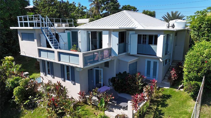 Discover a rare investment opportunity in the highly desirable Puntas, Rincón, Puerto Rico! This versatile 5-bedroom, 5-bath property offers endless possibilities, with each room designed as an individual unit—complete with its own kitchenette and private bathroom. Live in one space while generating income from the others, or operate the entire property as a multi-unit rental.
Situated on 713.86 m² of land and offering approximately 2,300 sq ft of interior living space, this property captures the beauty of Rincón with its stunning ocean views and unforgettable sunsets. The elevated location provides a tropical, peaceful vibe while keeping you close to beaches, surf spots, restaurants,  all in  Puntas.
Currently used as a primary residence with additional income-producing units, the layout provides flexibility for long-term rentals, short-term stays, or a combination of both. Whether you’re an investor searching for reliable returns or a buyer looking for a home that pays for itself, this property is an exceptional find.
A rare opportunity in one of Puerto Rico’s most sought-after coastal communities—your chance to live and earn in paradise.