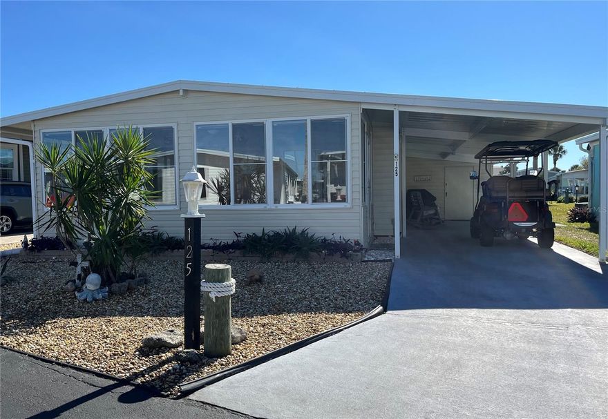 Back on the market, due to no fault of the seller. Move in ready 2bed/2bath Bungalow at the Beach! All of the updates have been done for you, so you will not have to do anything except move in and start enjoying the Beach Life! This home has a Metal roof, enclosed sun porch/Florida room, all newer appliances 2020-2022, hot water heater 2021, 4 Mini Split A/C Units 2022, bathroom remodel with walk-in tile showers in 2021. Upscale cabinets, flooring, vanities and solid surface countertops throughout, and it comes partially furnished!. Perfect placement in the kitchen for the chef in the family with lots of counter space. Washer and dryer is conveniently located just off the kitchen, with plenty of storage throughout the home. This adorable home has easy maintenance landscaping, extra long driveway with room for 2 cars under the carport and a golf cart parking pad. Surfside Estates, an active 55+ Manufactured Home Community that is nestled between the Atlantic Ocean and the Intracoastal Waterway. Surfside Estates is a Resident Owned land share Community which means there is no lot rent! When you purchase your home in Surfside Estates you own a share of this beautiful beachside community. The monthly maintenance fee is $180/month and includes wi-fi, internet, cable, yard maintenance, management and use of all the facilities. There is an inground heated/cooled pool, fitness room, library, shuffleboard court and rooftop deck. The Social Club offers many activities to get involved as much or as little as you like. Friday night bingo, men's and lady's cards, pool tables and large screen TV for all your sporting events. Exercise classes and water aerobics. Walk to the beach across the street or ride your bike or golf cart to one of the 2 docks to enjoy fishing or just relax and enjoy the sunsets and the boats and dolphins go by. There is kayak storage, a BBQ Pit and gazebo with a view of the Intracoastal. The quaint neighboring town of Flagler Beach is just a few minutes down the road, where you will find a variety of shops and restaurants to choose from. Just over the bridge you will find shopping, restaurants, hospitals and doctors. What are you waiting for? Time to get out of the cold and start enjoying the salt life today! *List of furniture items that do not convey is available on line and in the home.