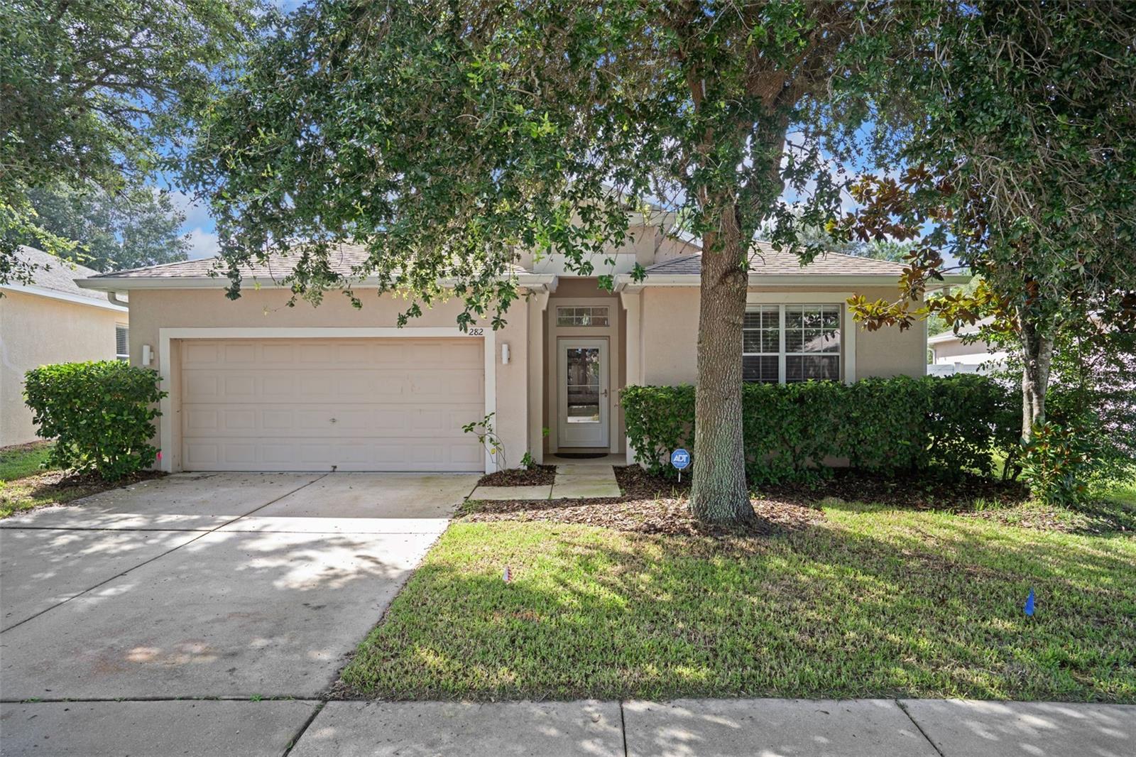 WELCOME HOME to this well maintained 3 Bedroom, 2 Bathroom Beauty located on an oversized lot in the charming community of Brighton Place in the Villages At Avalon, an inviting neighborhood that is conveniently located within minutes of the Suncoast Parkway and other major Commuter Routes as well as easy access to vibrant Retail and Dining, top Medical Facilities, countless Activity, Entertainment and Cultural Venues as well as beautiful Parks and the sparkling Gulf waters! This spacious floor plan boasts an “Open Living” concept maximizing every inch of space! Upgrades include Roof (2025), HVAC (2021), Water Heater (2025), Upgraded Flooring (2021), a Garage based EV Charging Outlet (2024)...and soooo much more! Step through the Entry into the Foyer accented by a 6-Lite Transom Window, the perfect Drop Zone location! Too many Cooks in the Kitchen? Abundant counterspace means there is room for everyone! Featuring a Closet Pantry, upgraded Appliances, a wraparound Casual Dining Counter and a handy Flex Space (Workstation, Café Dining or future Coffee Bar!) - the Kitchen is the heart of this home! Love to Entertain? Bathed in Natural Light and accented by warm neutral decor, the Great Room will be the gathering spot for family and friends! From formal Dinners to Family Game Nights, the Dining Area can easily accommodate! The luxurious Primary Suite features a Walk-in Closet and a lovely en suite Bath with a Dual Vessel Vanity, a decadent Garden Tub and a Glass-framed Shower – no bumping elbows here! The Secondary Bedrooms are generous in size with ample Closet Space and are situated for maximum privacy! The interior Laundry Suite is positioned to offer the most in convenience and is equipped with additional space for Storage! Enclosed within Vinyl Picket Fencing, Outdoor Living is comprised of a relaxing Covered Lanai that is surrounded by luscious Green Space – ideal for Pets, Play and Gardening in addition to plenty of room for a Pool! Community amenities include a stylish Clubhouse, Community Pool and Fitness Center! You won’t want to miss this one - light and airy, this fantastic home is sure to impress!
