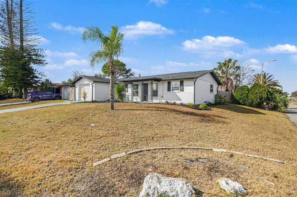 Photo of 11241 Yewtree Avenue, Port Richey, FL 34668 (MLS # O6381415)