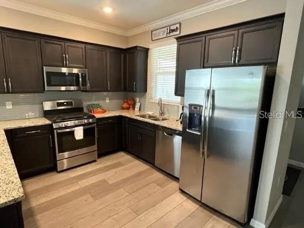 Photo of 9891 SW 99th Loop, Ocala, FL 34481 (MLS # OM721423)