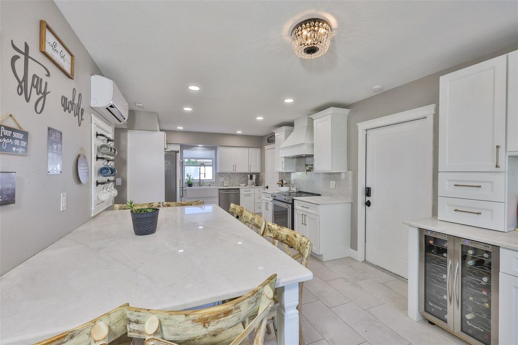 Photo of 12468 Empire Drive, Seminole, FL 33772 (MLS # TB8390748)