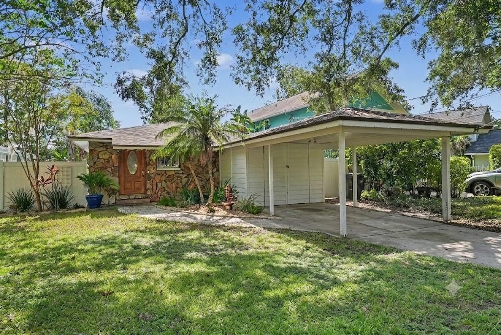 Photo of 12320 Woodleigh Avenue, Tampa, FL 33612 (MLS # TB8529843)