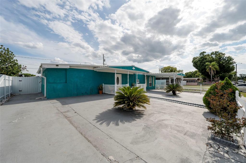 Photo of 7511 Tidewater Trail, Tampa, FL 33619 (MLS # TB8502312)
