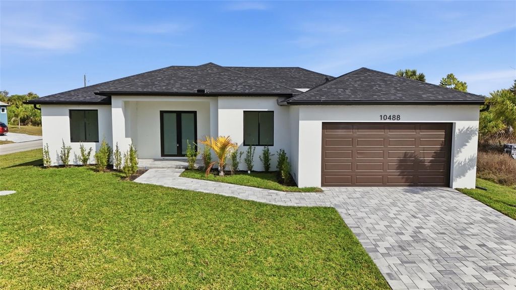 Photo of 10488 Van Wyck Terrace, Port Charlotte, FL 33981 (MLS # O6391711)