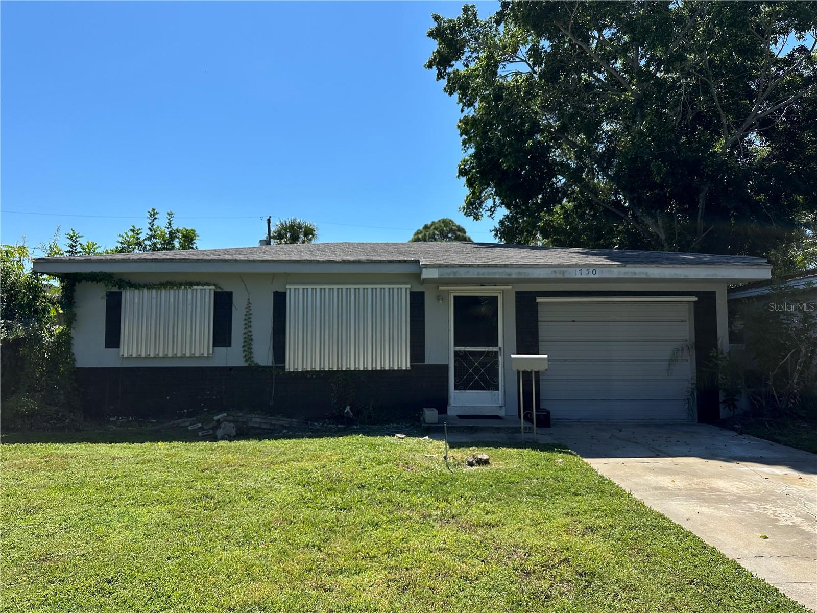 Hurricane Helene damaged home on a 5,000 sq ft lot being sold for lot value or complete renovation and CASH ONLY offers! The Shore Acres neighbohood has so much to offer. Lots of parks, the Shore Acres community center, waterfront recreation and an easy ride to DTSP, I-275 & Tampa airport.