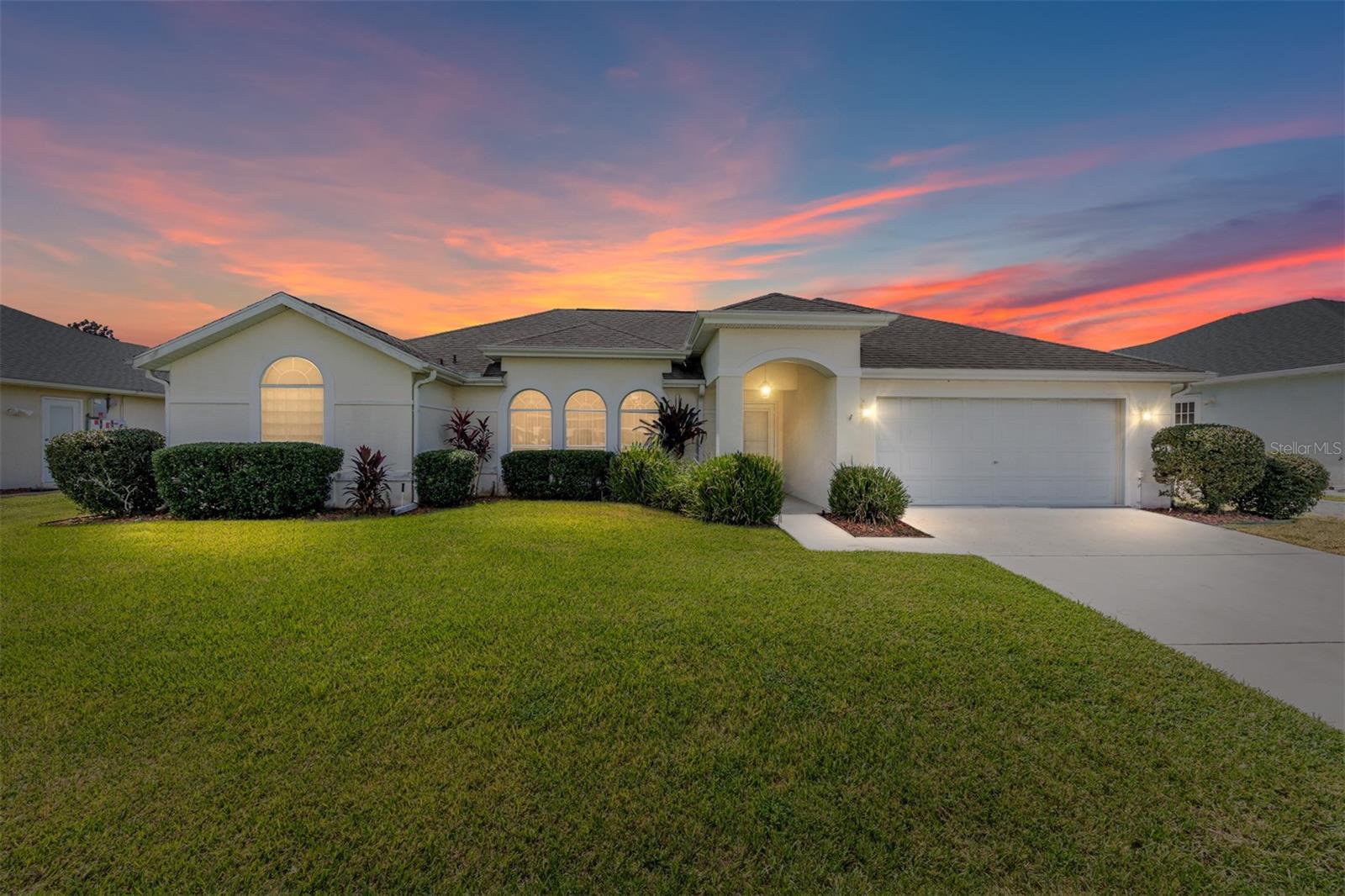 Welcome to Ocala Palms Golf and Country Club! Enjoy your retirement affordably. This Sabel II home features 1,569 square feet, 2 bedrooms and 2 baths. The interesting, vaulted and coffered ceilings are evident throughout the well cared for home. You will notice a split floor plan and features a living room, formal dining and separate family room. The laundry room features newer washer and dryer and provides lots of storage. The kitchen is nice and bright with newer, Whirlpool refridgerator and stove. The countertops are granite throughout the home. The Master bedroom ensuite is beautiful with a tray ceiling. The roof and HVAC are from 2018. Don't forget your pup as there is a fenced back yard! The back yard is also a perfect place to light up your grill! There are lots of amenities as well, including: an indoor and outdoor pool, fitness center, new pickle ball courts and pavillion (coming in early 2026), shuffle board, bocce ball, prestine grass area for croquette and a beautiful golf course! Come take a look at this friendly golf cart community. Room measurements are approximate. Shown by appointment only.