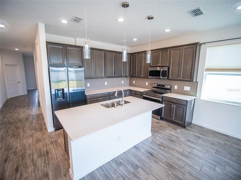 Photo of 1257 Hendon Loop, Davenport, FL 33837 (MLS # O6377906)