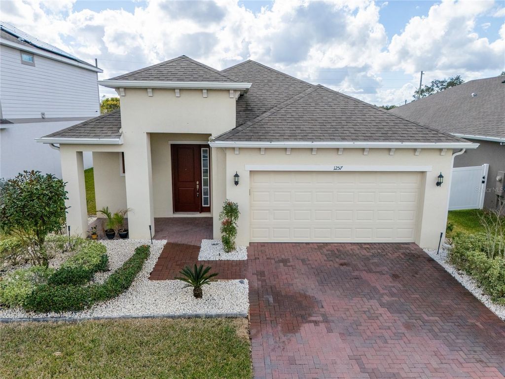 Photo of 1257 Hendon Loop, Davenport, FL 33837 (MLS # O6377906)