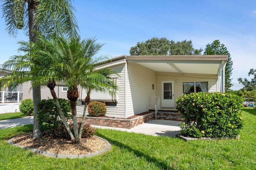Fantastic price on this well-maintained 2 bedroom, 2 bath doublewide home offering 1,066 sq. ft. of interior living space plus an additional enclosed lanai in a 55+ waterfront community with GULF ACCESS via the Myakka River. Located in the pet-section on a quiet street in Harbor Cove, the HOA fees are only $150 per month! This affordable residence features a bright, open kitchen with breakfast bar and pantry, adjacent dining area with built in cabinetry and a spacious living room. Access the lanai from either the dining area sliding doors or the primary bedroom, adding nice light to both areas. With a split-bedroom layout for privacy, the generous primary suite has an ensuite bathroom with newer shower (2024) and the 2nd bedroom allows plenty of space for guests. The hall bathroom has also had some updates. Other recent improvements include a newer AC unit, subfloors and flooring (2023) and new AC ductwork and vapor barrier (2025). A covered front porch is another spot for viewing lovely sunsets and a large double shed (20x8) with washer and dryer, also creates room for storage and tools. The long carport and driveway will fit multiple vehicles. Residents enjoy 2 heated swimming pools, a hot tub and an optional boat slip rental at the marina for just $100 per year. Take advantage of the full calendar of social events and games and meet new friends at the 2-story clubhouse overlooking the 90-slip marina with new docks. Workout at the fitness center and stay active with water aerobics, volleyball, pickle ball, tennis, bocce, shuffleboard, and billiards. Unleash your creativity at numerous arts and crafts classes or the optional woodworking shop. Ideally located just a short drive to beautiful beaches, restaurants, shopping (including Costco) and quality medical facilities, this property offers the perfect blend of relaxation, recreation, and affordable community living. Schedule a private showing today!