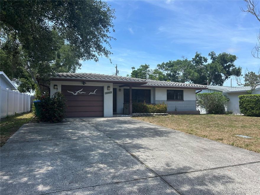 OPPORTUNITY KNOCKS with this charming block single-family home located in the desirable Blossom Lake Village community! This 2-bedroom, 1.5-bath (.5 bath in garage) residence offers a functional layout with a 1-car garage and plenty of potential for customization. Featuring classic terrazzo floors throughout, this home provides a solid foundation ready for your personal touch and updates.  Enjoy outdoor living in this spacious backyard with a cement patio great for your favorite outdoor patio furniture, perfect for relaxing or entertaining.  Need additional storage for those tools this home has you covered with the barn like shed for extra storage. Updated electrical panel is a nice feature everyone will appreciate.  Situated in a non-evacuation zone, this property offers added peace of mind.  Whether you're looking for a starter home, investment opportunity, or a place to renovate and make your own, this property is full of possibilities. Don’t miss the chance to bring your vision to life in this well-located neighborhood!  Call today for showing instructions before this one is gone!