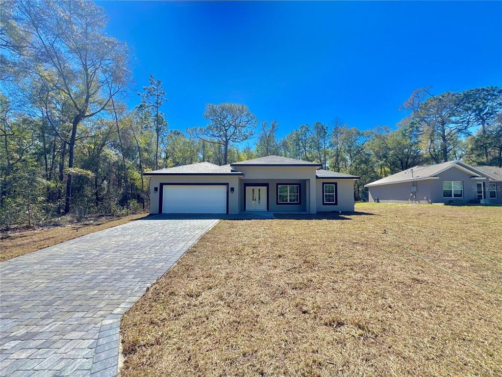 Photo of 1952 W Beach Plum Drive, Citrus Springs, FL 34434 (MLS # O6388287)