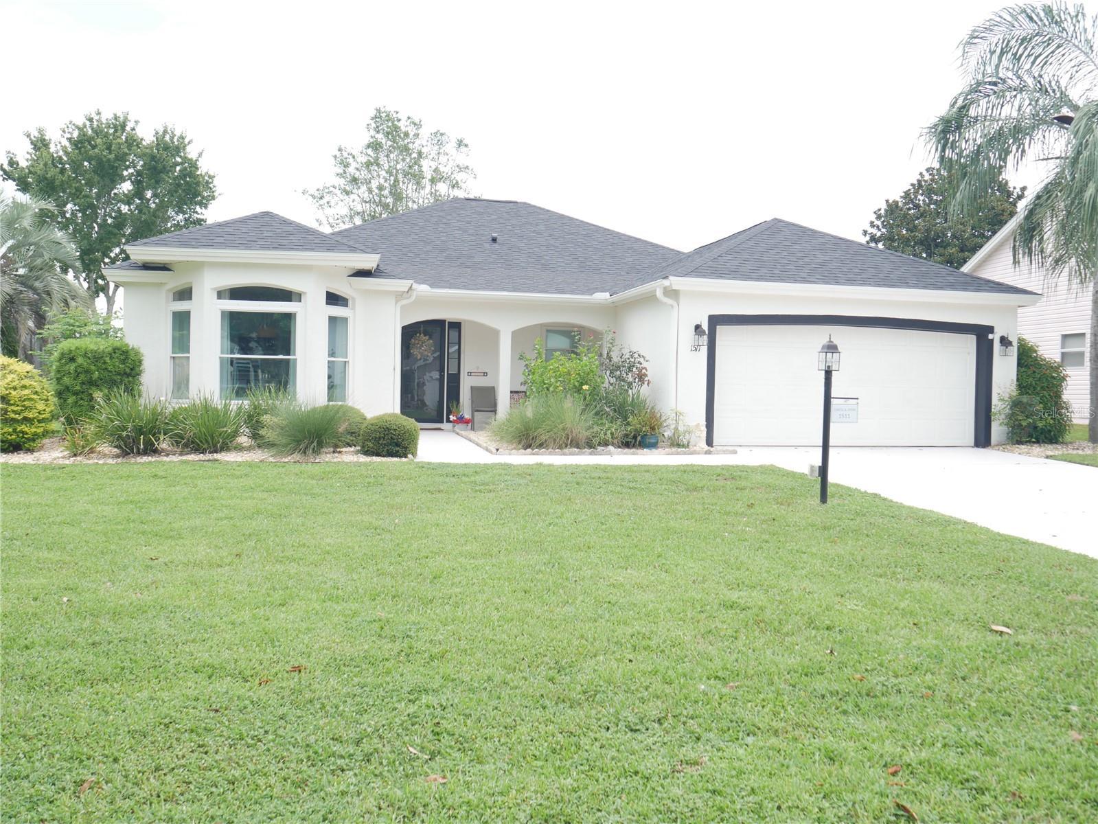 Bond Paid - Turn Key with Golf Cart Immaculate 3 Bedroom/2 Bath Block/Stucco Designer Home with Beautifully Updated Interior Located in the Village of HACIENDA SOUTH. Many Updated Features Including New Roof (2025), Private/Screened Saltwater Pool (marcite resurfaced in 2025) plus Newer Filter/Heater,skylights(2025), HVAC (2 years), Water Heater (3 years) Irrigation solonoid (2025) Upgraded Cabinetry/Quartz Counters Kitchen and Baths, Ceramic Wood Plank Tile throughout, Washer/Dryer(3 years), Storms Door 2024, Pool Bird Cage Screens (2023). Newer Light fixtures Kitchen,Dining, Hall plus many others inside/outside,Other Features Include Solar Shower (Pool), Nest Thermostat, Newer Triple Pane Hurricane Windows, and Many More Upgraded Deluxe Features. This Homes Shows Very Well. Property is Located only a few minutes from the Spanish Springs and Lake Sumter Landing Town Centers, Dining ,Stores,Grocery Stores, Banking, Medical/Hospital, Golf, and. Recreation Centers