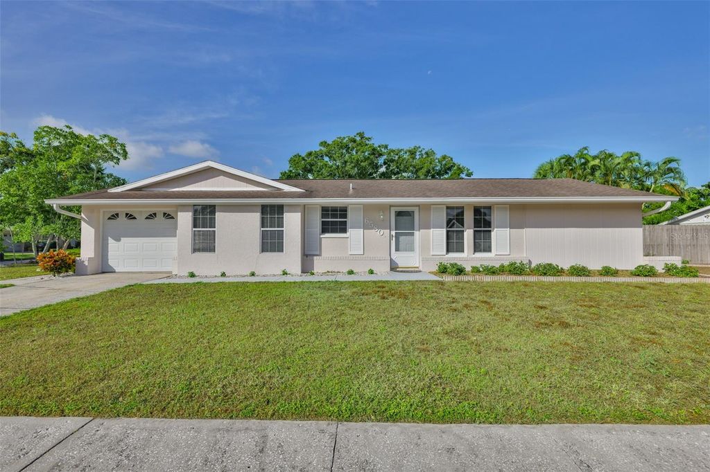 Photo of 6580 Channelside Terrace N, Pinellas Park, FL 33781 (MLS # TB8447134)