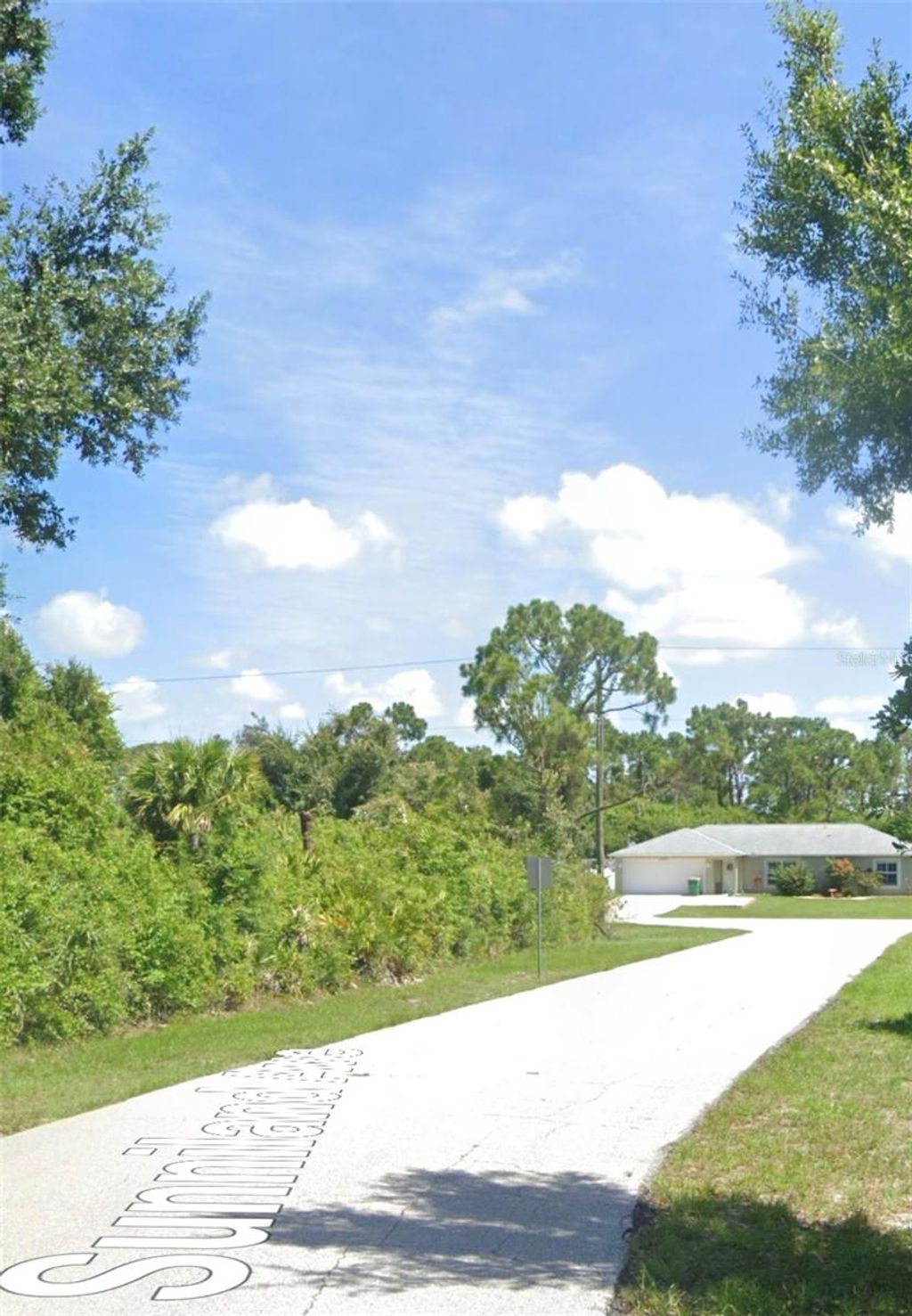 Photo of 12343 Sunniland Avenue, Port Charlotte, FL 33981 (MLS # A4667231)