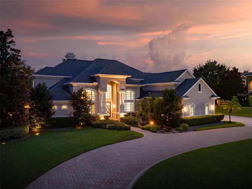 Property now priced below recent appraisal!  
A rare find in an exclusive, 10-home gated subdivision of the estate homes of Coachman Hill Preserve.  This family/executive estate home of over 7100 heated sf was custom-built with additions and upgrades and is on 3/4 of an acre.  There are four bedrooms with adjustments possible to create more, if desired.  The features is what sets this apart!  Healthy home features include whole house water filter, new HVAC ducting, whole house generator and rooms for all generations.  This is where elegance and sophistication meet comfort, in a secure family neighborhood.

Entering via a landscaped gate area one drives to a circular driveway with its waterfall feature. The two garages are set off on the west side.  (note: two of the four garage spaces was converted into an extremely large playroom, but is easily changed back if desired (it is not counted in the heated sf)).  Unique architectural design evident with expansive windows, high ceilings and a pool area that is hard to compare - waterfall, barbecue, spa, shower, restroom and an adjacent large enjoyment room (21' x 35') with cabinetry, bathroom, kitchenette etc.  What a gathering place!

Executive office has custom bookshelves along with a built-in aquarium (easily maintained).  

Upon entering the home you are immediately struck by the grandeur of the foyer, adorned with a dazzling chandelier and a spacious living area bathed in natural light.   Thanks to the floor-to-ceiling windows there are spacious views of the surrounding pool and landscape. A well-located elevator provides service.

The gourmet kitchen is a chef's dream, equipped with top-of-the-line appliances, custom cabinetry, overly large refrigerators, and a large center island perfect for both meal preparation and casual dining. Adjacent to the kitchen is a cozy breakfast nook overlooking the pool, patios and lush backyard. Pantry and formal dining room are conveniently nearby for family and for hosting. 

The roomy master suite is a first-floor sanctuary, featuring a private sitting area, luxurious en-suite bathroom with a soaking tub and an oversized shower and walk-in closet. Each additional bedroom is generously sized and provides comfort and privacy for family and guests alike. There are full floor plans with dimensions included herein.

Outside, the expansive backyard is an oasis of tranquility, complete with a sparkling swimming pool with its waterfall, a spa, a built-in barbecue area and two covered patios perfect for alfresco dining and entertaining.

Don't forget the state-of-the-art home theater with seating for eight, with its own restroom and amenities!  Note that roof replaced and hurricane strapped in 2019. 

Experience the epitome of luxury living in this meticulously designed home, where every detail has been carefully curated to provide the ultimate blend of comfort, style, and sophistication.  All generations have a place to work, play, enjoy and create memories.