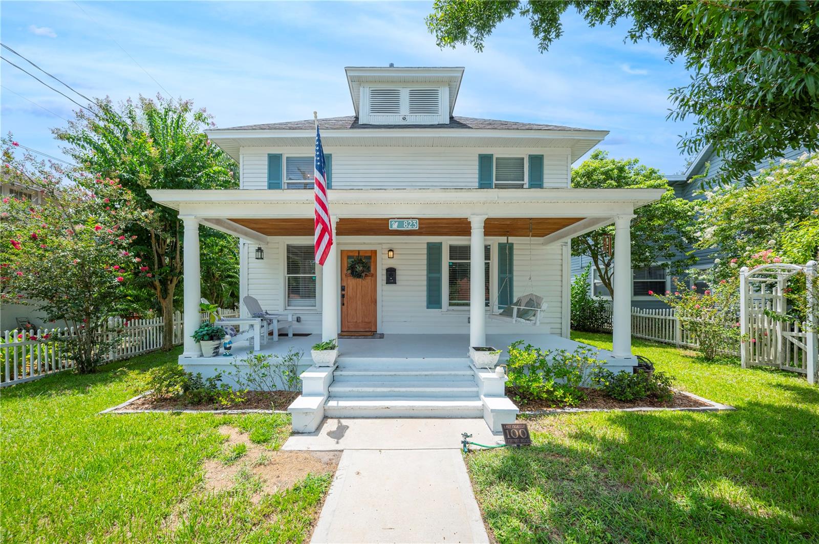 Welcome to this beautifully remodeled 1918 charming historic home in the coveted South Lake Morton neighborhood! With a full interior update in 2021, this charming residence seamlessly blends historic features with modern amenities, offering a versatile and comfortable living space. This spacious home features 4 bedrooms, 3 full bathrooms, and 2-primary suites, one on each floor. The layout is designed for flexibility and convenience, making it perfect for a variety of living arrangements. The large front porch, original pine wood flooring, built-in bookshelves, and china hutches preserve the home's historic charm, while modern upgrades such as the open kitchen with quartz countertops and a stunning wood range hood add a contemporary touch. Venture upstairs and you'll find 3 bedrooms and 2 full bathrooms. The expansive primary ensuite includes a large bathroom with a walk-in tiled shower, dual sink vanity, and 2 walk-in closets. The abundance of natural light, enhanced by large windows and tall ceilings, creates a bright and inviting atmosphere throughout the home. The exterior features a delightful picket fence enclosing the front yard, providing an ideal spot for morning coffee or evening relaxation. Situated in the heart of swan-loving Lake Morton, this home is just a block away from popular local spots like Black and Brew Coffee House, Lakeland Library, and Peach House as well as Florida Southern College home to Frank Lloyd Wright architecture and downtown Lakeland! With nearly 2,000 square feet of living space, a new wood privacy fence installed this year, and a complete interior remodel in 2021, including the AC system, plumbing and new insulation, this property offers the quintessential Lakeland historic home experience with all the modern comforts and conveniences you're looking for!