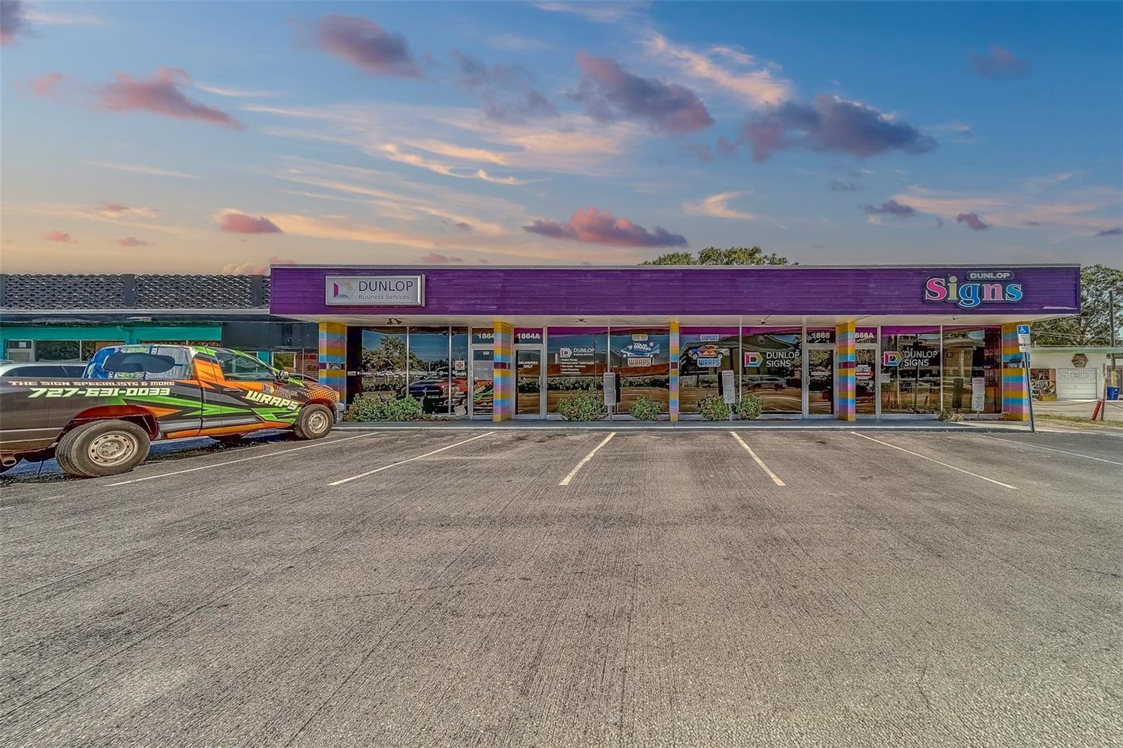 Zoned Commercial. Your Next Business Opportunity! Excellent opportunity to own this 4-door retail/shopping center space with warehouses/storage/garage spaces behind the main building. Highly visible store front on busy Drew St in Clearwater. This building has housed a thriving sign company for over 30 years. Building currently has a tenant that will be vacating prior to closing. (negotiable)
Looking for a versatile commercial space that checks all the boxes? This gem is calling your name! We've got a solid 2,898 sq ft shopping center with an additional 1,650 sq ft of warehouse space – talk about flexibility!
Location? Absolutely stellar. You're just a quick 20-minute drive from St. Pete Clearwater Airport and a smooth 30 minutes from Tampa International. No flood zone worries here, and it's zoned C, which means tons of potential for different business types.
Perfect for entrepreneurs who want to own their workspace or investors looking for a smart opportunity. The real magic is in the details: over 25,000 cars cruise by on Drew Street daily. That's some serious foot (and wheel) traffic!
The bonus? Storage space behind the stores means extra potential for your business. Whether you're thinking retail, services, or a hybrid setup, this property is ready to make your business dreams a reality.
Don't miss out on this turnkey commercial property that's just waiting for the right visionary to make it shine!