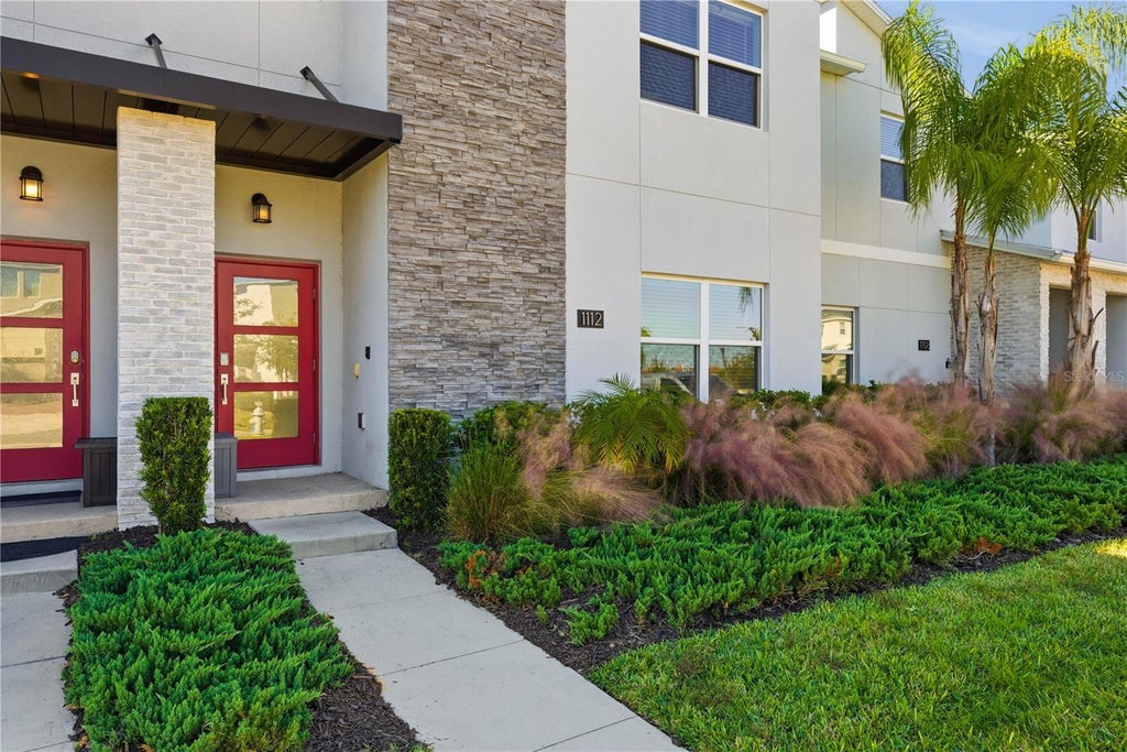 Photo of 1112 Challenge Drive, Davenport, FL 33896 (MLS # O6428864)