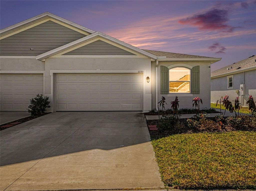 Photo of 32310 Lexington Street, Wesley Chapel, FL 33543 (MLS # TB8472536)