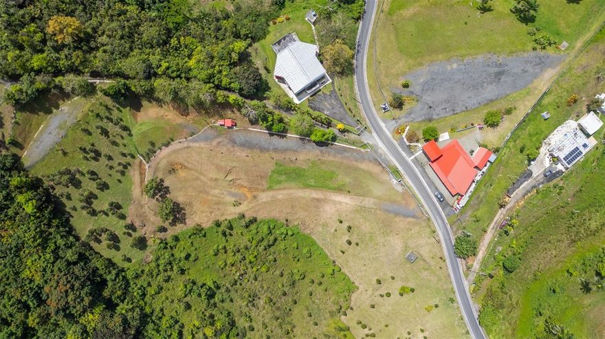 This property is located on the border between Caguas and San Lorenzo at Carr. 788 Km. 3.2, Bo. Quemado Sector, Buenos Aires, with approximately 1.5 cuerdas of land, offering the ideal space to develop or build the property you have in mind, in a quiet setting with easy access to the main roads of the area. The property features a 20 kW electric generator, a 2,000-gallon cistern, is fully fenced, and has a cement wall entrance gate, providing greater privacy and security. 
For more information or to coordinate a visit, do not hesitate to contact us.