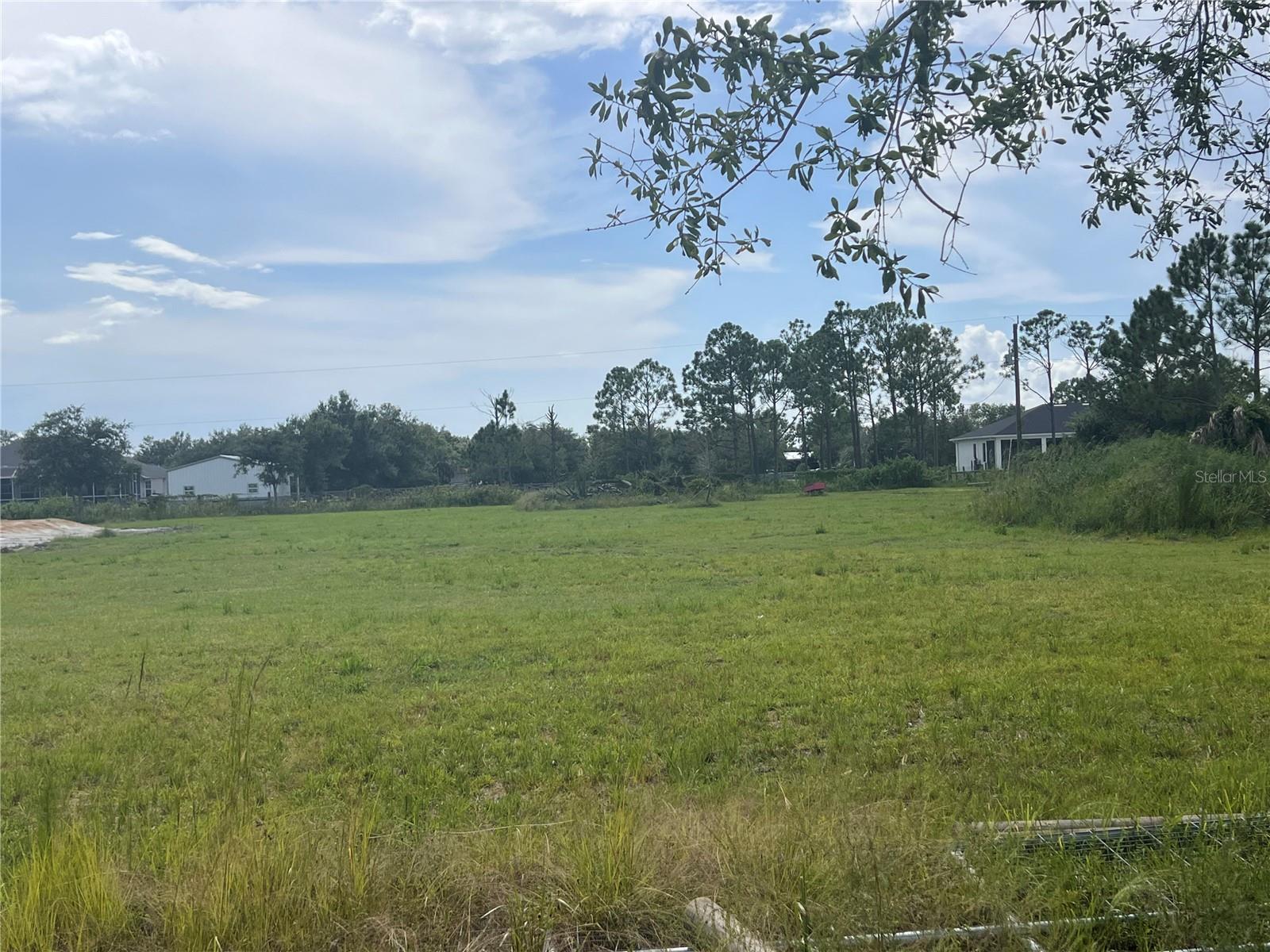 Build Your Dream Home on 1.25 Acres – No HOA, No Flood Zone!
Discover the perfect canvas for your future home with this spacious 1.25-acre lot, located outside of a flood zone for added peace of mind. Enjoy total freedom with no HOA or CDD fees, and the flexibility to create a truly private retreat. Whether you dream of a sprawling ranch, a custom home with a pool, or space for your animals to roam freely—this property can accommodate it all.
With electricity nearby and plenty of room to add a garage, workshop, or store your RVs, boats, and toys, this lot offers both convenience and potential. Surrounded by natural beauty and privacy, it's your chance to own a slice of Florida where you set the rules.
Don't miss this rare opportunity—bring your vision and make it yours!