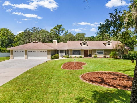 Photo of 6655 Millstone Dr, New Port Richey, FL 34655 (MLS # TB8539075)