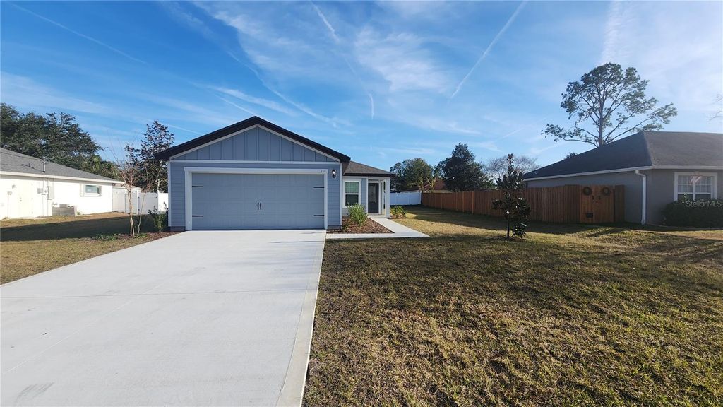 Photo of 10 Prairie Lane, Palm Coast, FL 32164 (MLS # FC317086)