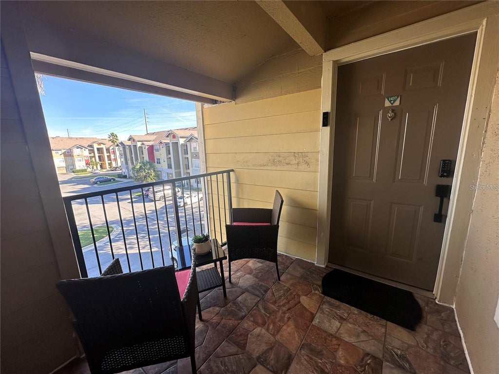 Photo of 2216 Grand Cayman Court #1437, Kissimmee, FL 34741 (MLS # O6448899)