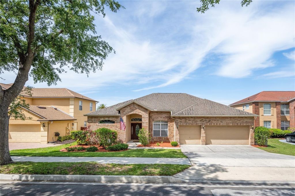 Photo of 7841 Belvoir Drive, Orlando, FL 32835 (MLS # O6397954)