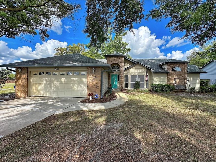 Welcome Home!!  Nestled beneath the canopy of beautiful mature oak trees on a large corner lot, this exceptional 4-bedroom, 2-bathroom home offers the perfect blend of warmth, space, and classic Florida charm in one of Winter Garden’s most desirable locations. From the moment you arrive, the inviting curb appeal and expansive lot create a welcoming first impression that immediately feels like home.

Inside, the thoughtfully designed split floorplan provides both privacy and functionality, featuring a formal living room and elegant formal dining room ideal for entertaining guests or hosting family gatherings. At the heart of the home, the spacious family room showcases a stunning wood-burning fireplace, creating a cozy focal point perfect for relaxing evenings and holiday memories. The seamless flow of the living spaces makes this home ideal for both everyday living and entertaining alike.

Step outside to the oversized screened-in rear porch, where you can unwind while overlooking the spacious backyard shaded by majestic oak trees. Whether enjoying your morning coffee, hosting weekend barbecues, or simply appreciating the peaceful outdoor setting, this backyard offers endless possibilities for relaxation and recreation.

This home has been meticulously maintained with several important updates already completed, including a roof replaced in 2018 and an HVAC system installed in 2022. Additional features include public water and sewer, an irrigation system to keep the landscaping lush year-round, and gutters with leaf guards for added convenience and low-maintenance living. Best of all, enjoy the benefits of a LOW HOA at only $250 annually.

Combining timeless character, generous living spaces, mature landscaping, and major system upgrades, this Winter Garden gem offers an incredible opportunity to enjoy comfortable Florida living just minutes from shopping, dining, entertainment, and major commuter routes.