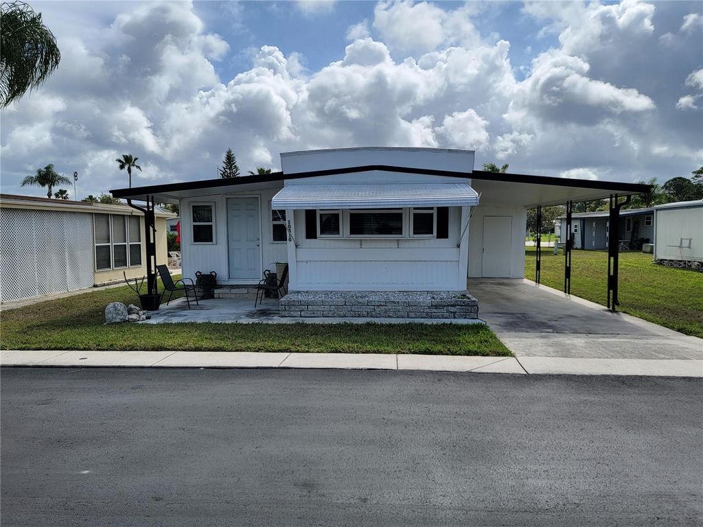 Photo of 10810 Tioga Drive, Port Richey, FL 34668 (MLS # TB8488128)