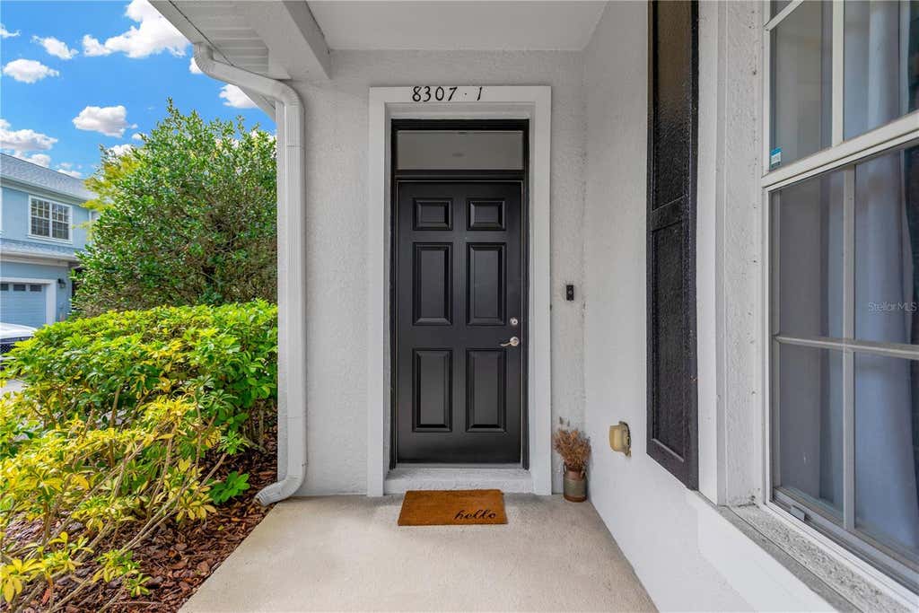Photo of 8307 Manor Club Circle #1, Tampa, FL 33647 (MLS # TB8543211)