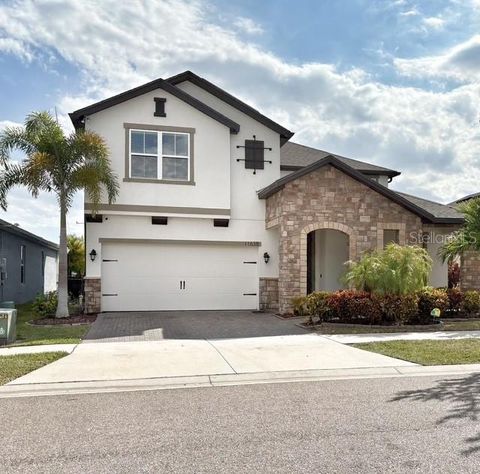 Photo of 11638 Sweet Tangerine Lane, Tampa, FL 33626 (MLS # TB8440606)