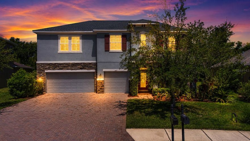 Located on a private conservation lot with no rear neighbors, this stunning two-story pool home in Oakleaf Hammock offers the perfect combination of space, upgrades, and outdoor living. Backing to a wooded preserve for exceptional backyard privacy, this beautifully maintained residence features 5 bedrooms, 4.5 bathrooms, and an ideal layout for both everyday living and entertaining.
From the moment you arrive, you’ll appreciate the impressive curb appeal with stone accents on the front elevation, paver driveway, and a NEW ROOF in 2025. Inside, the home showcases tile flooring throughout the main living areas of the first floor, engineered hardwood flooring in the formal dining room, elegant plantation shutters throughout, and trayed ceilings in both the family room and primary suite.
The gourmet kitchen is designed to impress with stainless steel appliances, granite countertops, stacked cabinetry with decorative glass inserts, a large center island with abundant seating, and plenty of workspace and storage for the home chef.
The spacious primary suite serves as a private retreat featuring a luxurious ensuite bath with granite countertops, dual sinks, upgraded cabinetry, Kohler jetted garden tub, walk-in shower, and an extra large walk-in closet with built-ins and generous storage space.
Upstairs, you’ll find a large bonus/great room along with four additional bedrooms and two full bathrooms, offering ample room for family, guests, or multigenerational living.
Step outside to your oversized screened lanai featuring a heated saltwater pool, private pool bath access, and peaceful wooded views that create the perfect Florida outdoor oasis. Additional features include reclaimed water for irrigation to help lower utility costs and aluminum corrugated impact shutters for windows and doors.
Located in the vibrant community of Oakleaf Hammock with low HOA fees and NO CDD fees, residents enjoy playgrounds and convenient access to I-75, the Ellenton Premium Outlets, dining, sports facilities, Gulf beaches, and more. This exceptional home offers the ideal blend of privacy, functionality, and location. Don’t miss your opportunity to make it yours!
