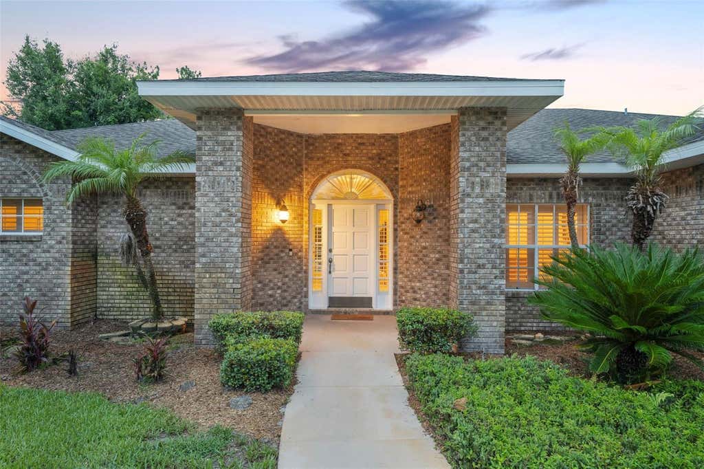 Photo of 1303 Acres Drive, Apopka, FL 32703 (MLS # O6417647)