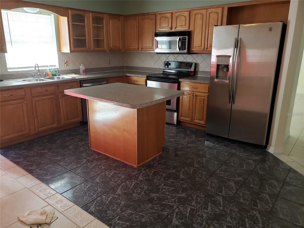 Photo of 3792 Dunwich Avenue, Orlando, FL 32817 (MLS # O6423085)
