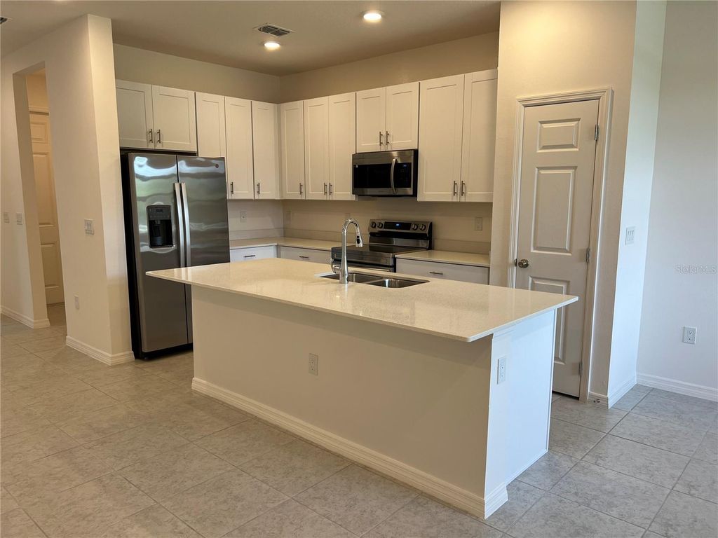 Photo of 5210 Ferndale Alley, Saint Cloud, FL 34771 (MLS # O6346674)