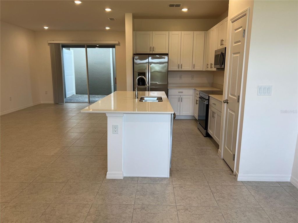 Photo of 5210 Ferndale Alley, Saint Cloud, FL 34771 (MLS # O6346674)