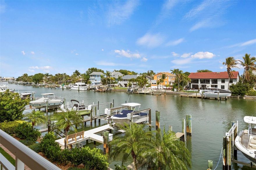 Tierra Sound Townhomes in the Island Community of Tierra Verde.  This beautiful Townhome has a private garage and a deeded boat slip.  The main living level has a large living room with fireplace and a private balcony overlooking the waterfront and your own personal boat slip!  The dining room is open to the updated kitchen with newer appliances, breakfast bar, buffet and two pantry closets.  A powder bath on this level is convenient for entertaining and has a linen closet for additional storage.  The upper level presents two full suites.  The waterfront primary suite has a beautiful sunrise view, two custom closets and a large ensuite bath with double vanity, jetted tub and separate shower.  The second suite has a private balcony overlooking the pool, a generous closet and ensuite bath with tub and shower.  The lower level is open to the waterfront and provides a third guest suite or bonus room with full bath.  Leading to the docks and boat slips, the screened porch from this level will become your favorite room in the house - whether enjoying a quiet coffee at sunrise or grilling your fresh catch at sunset!  Tierra Sound has a gorgeous Community Pool with all new patio furniture and Tiki Bar. This pet friendly community welcomes residents of all ages.