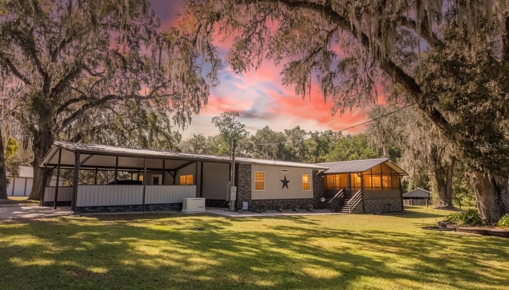 Photo of 17807 SW Archer Road, Archer, FL 32618 (MLS # OM711623)