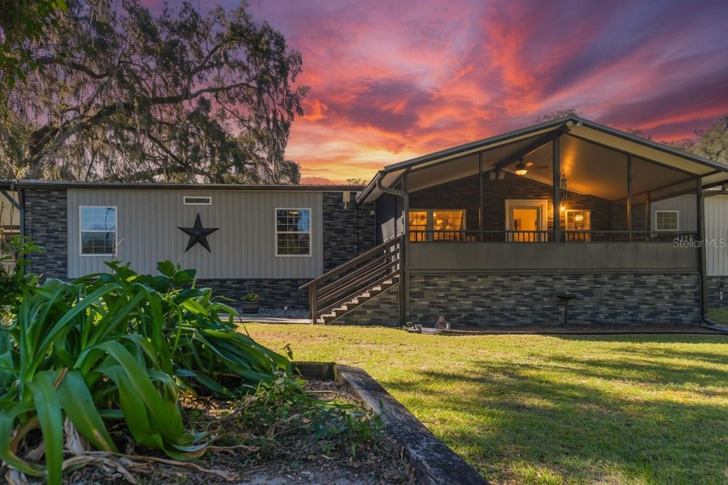 Photo of 17807 SW Archer Road, Archer, FL 32618 (MLS # OM711623)